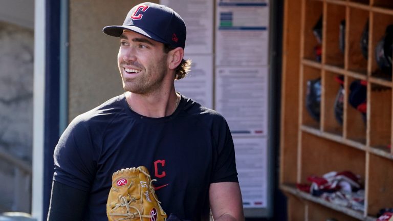 Cleveland Guardians' Shane Bieber walks through the dugout during a workout ahead of Game 1 of baseball's American League Division Series against the New York Yankees, Monday, Oct. 10, 2022, in New York. (John Minchillo/AP)