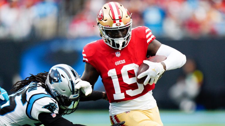 San Francisco 49ers wide receiver Deebo Samuel runs past Carolina Panthers cornerback Donte Jackson during the second half an NFL football game on Sunday, Oct. 9, 2022, in Charlotte, N.C. (Jacob Kupferman/AP)