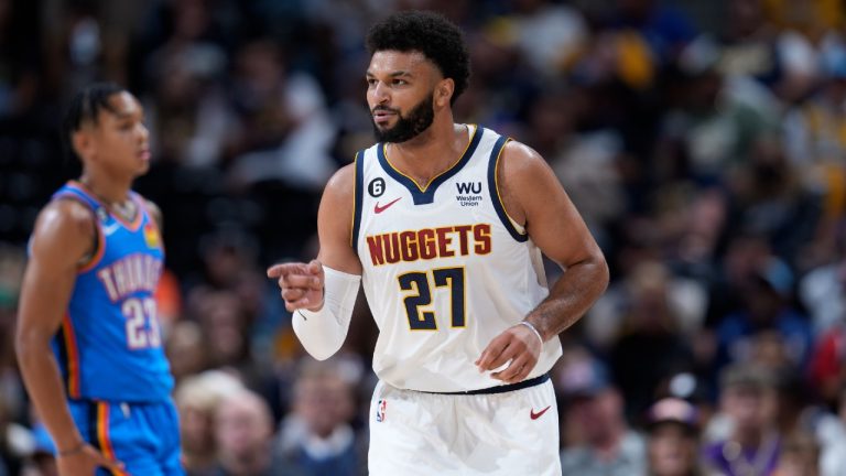 Denver Nuggets guard Jamal Murray (27) directs teammates in the first half of an NBA preseason basketball game against the Oklahoma City Thunder, Monday, Oct. 3, 2022, in Denver. (David Zalubowski/AP)