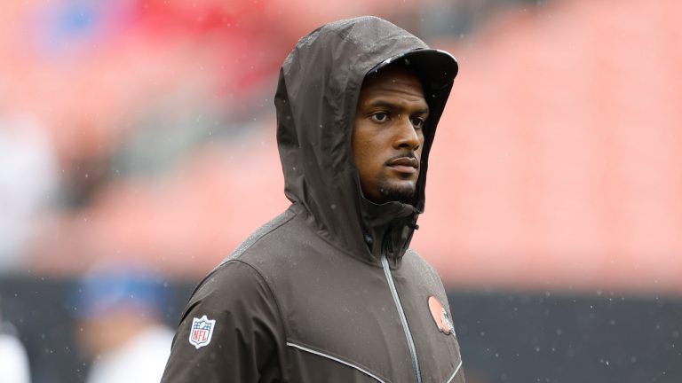 Cleveland Browns quarterback Deshaun Watson walks on the fields with the team as they warm up before an NFL preseason football game against the Philadelphia Eagles in Cleveland, Sunday, Aug. 21, 2022. (Ron Schwane/AP)