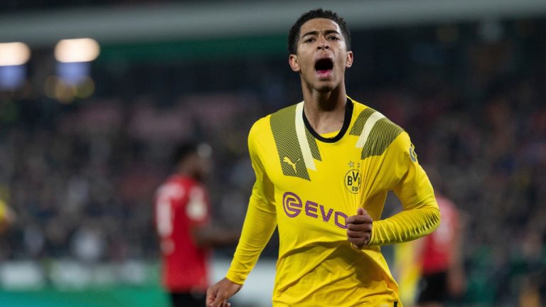 Dortmund's Jude Bellingham celebrates after his penalty goal to 0-2 during the German soccer cup second round match between Hannover 96 and Borussia Dortmund, at Heinz von Heiden Arena in Hannover, Germany, Wednesday October 19, 2022. (Swen Pfortner/dpa via AP)