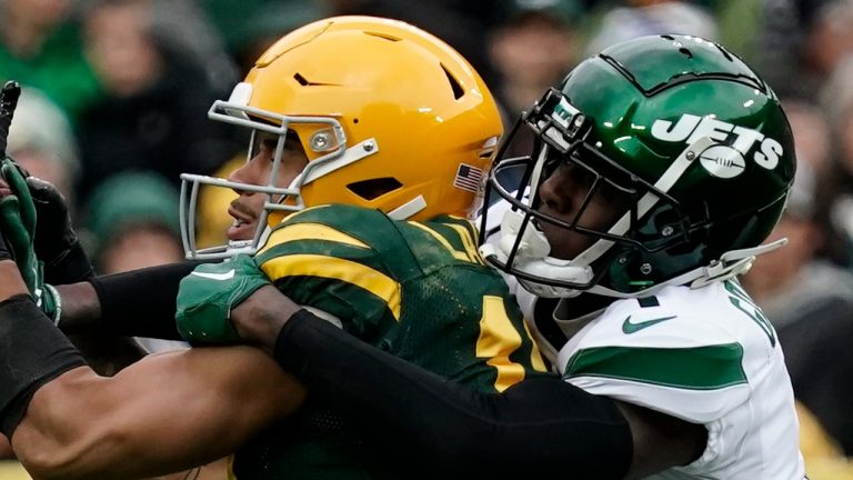 New York Jets cornerback Sauce Gardner, right, interferes with Green Bay Packers wide receiver Allen Lazard during the second half of an NFL football game Sunday, Oct. 16, 2022, in Green Bay, Wis. (Morry Gash/AP Photo)