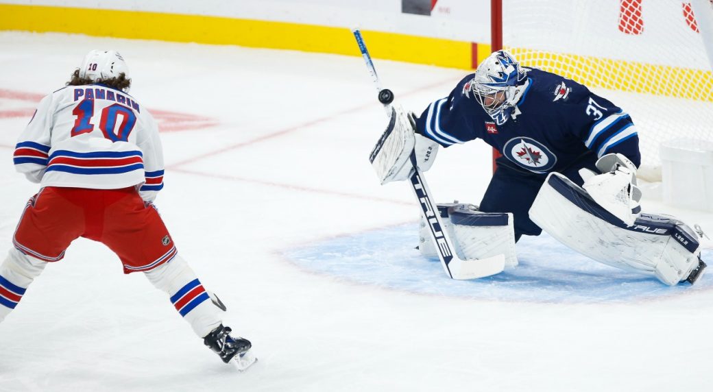 Hellebuyck turns in vintage performance in Jets’ season-opening win over Rangers