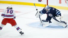 Hellebuyck turns in vintage performance in Jets&#8217; season-opening win over Rangers