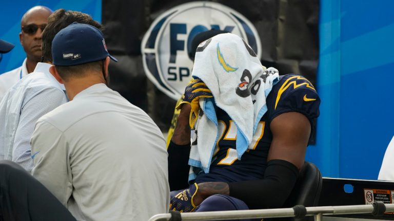 Los Angeles Chargers cornerback J.C. Jackson (27) reacts to an injury during the first half of an NFL football game against the Seattle Seahawks Sunday, Oct. 23, 2022, in Inglewood, Calif. (Marcio Jose Sanchez/AP)