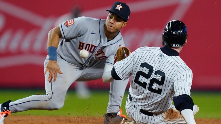 Houston Astros shortstop Jeremy Pena catches the throw to tag out New York Yankees Harrison Bader (22) who was attempting to steal second base during the fifth inning of Game 3 of an American League Championship baseball series, Saturday, Oct. 22, 2022, in New York. (John Minchillo/AP)