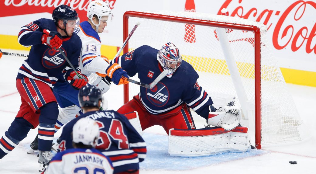 Winnipeg Jets preseason vs. Calgary Flames tonight, Connor Hellebuyck  starts in goal 