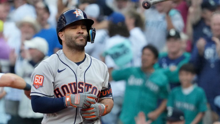 Houston Astros' Jose Altuve tosses his bat after striking out against the Seattle Mariners during the ninth inning in Game 3 of an American League Division Series baseball game Saturday, Oct. 15, 2022, in Seattle. (Ted S. Warren/AP)