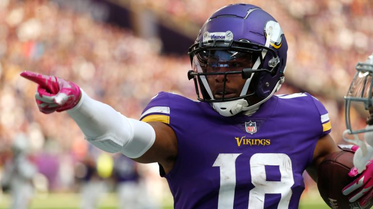 Minnesota Vikings wide receiver Justin Jefferson (18) reacts after catching a pass for a first down during the second half of an NFL football game against the Arizona Cardinals, Sunday, Oct. 30, 2022, in Minneapolis. (Bruce Kluckhohn/AP)