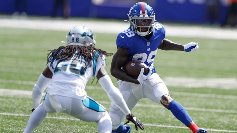 New York Giants' Kadarius Toney, right, runs with the ball during the first half an NFL football game against the Carolina Panthers, Sunday, Sept. 18, 2022, in East Rutherford, N.J. (Noah K. Murray/AP)