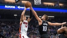 Kings outlast Heat, win first game of Mike Brown era