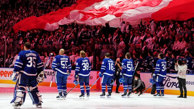 Toronto Maple Leafs players stand during the Canadian national anthem prior to NHL hockey action against the Washington Capitals in Toronto on Thursday, October 13, 2022. (Frank Gunn/CP)