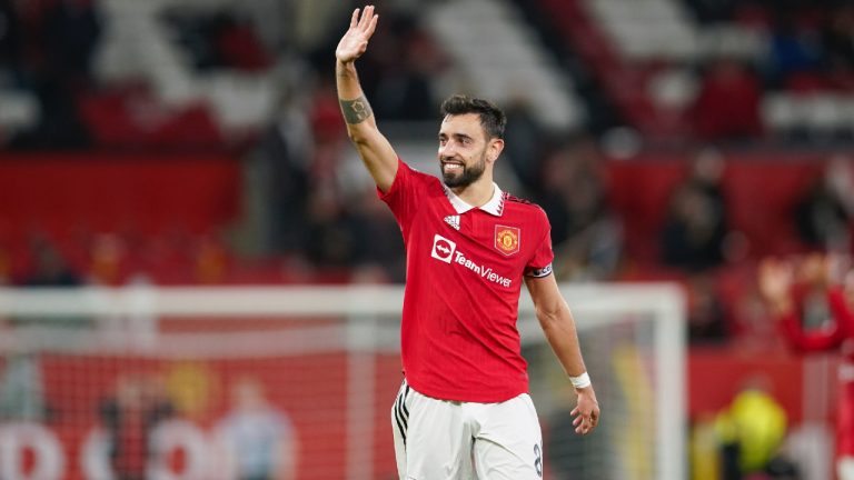 Manchester United's Bruno Fernandes waves to fans following the English Premier League soccer match between Manchester United and Tottenham Hotspur at Old Trafford in Manchester, England, Wednesday, Oct. 19, 2022. (Dave Thompson/AP)