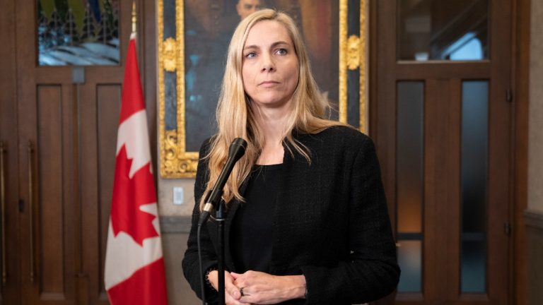 Minister of Sport Pascale St-Onge speaks with reporters before Question Period in the Foyer of the House of Commons, Tuesday, October 4, 2022 in Ottawa. (Adrian Wyld/CP)