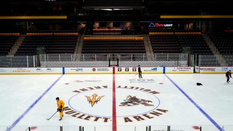 Members of the Arizona State University hockey team skate on the ice at the new Mullett Arena, Monday, Oct. 24, 2022, in Tempe, Ariz. The university will be sharing the arena with the Arizona Coyotes NHL hockey team. (Ross D. Franklin/AP)