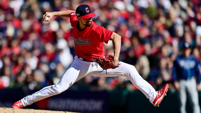 Cleveland Guardians' Nick Sandlin pitches in the tenth inning of a wild card baseball playoff game against the Tampa Bay Rays, Saturday, Oct. 8, 2022, in Cleveland. (David Dermer/AP)