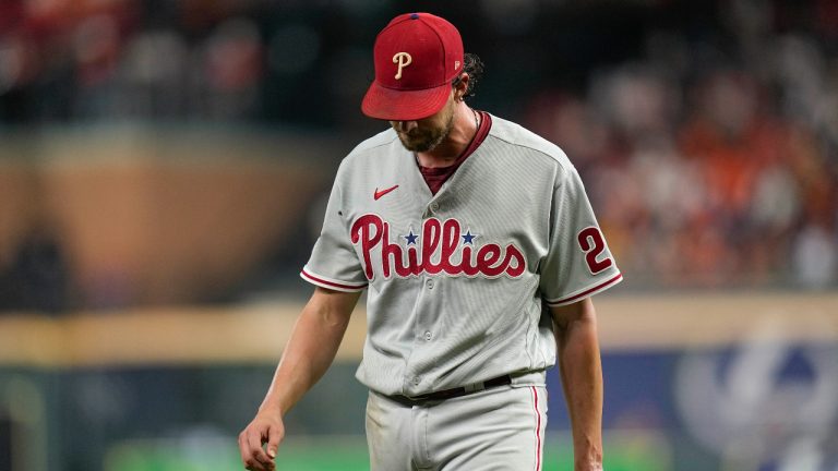 Philadelphia Phillies starting pitcher Aaron Nola walks to the dugout after the second inning in Game 1 of baseball's World Series between the Houston Astros and the Philadelphia Phillies on Friday, Oct. 28, 2022, in Houston. (AP Photo/Eric Gay)