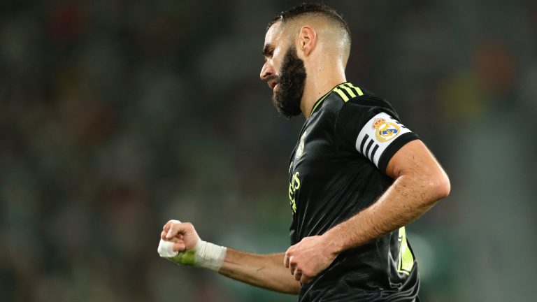 Real Madrid's Karim Benzema celebrates after scoring his sides second goal during the Spanish La Liga soccer match between Elche and Real Madrid at the Martinez Valero Stadium in Elche, Spain, Wednesday, Oct. 19, 2022. (Alberto Saiz/AP)