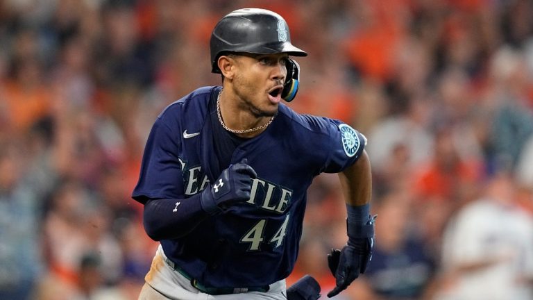 Seattle Mariners center fielder Julio Rodriguez (44) runs to first base after hitting a two-run double against the Houston Astros during the second inning in Game 1 of an American League Division Series baseball game in Houston,Tuesday, Oct. 11, 2022. (David J. Phillip/AP)