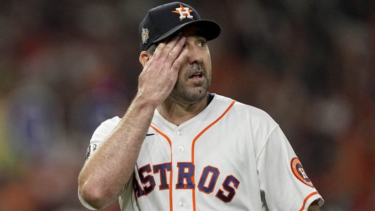 Houston Astros starting pitcher Justin Verlander walks to the dugout after the top of the first inning in Game 1 of baseball's World Series between the Houston Astros and the Philadelphia Phillies on Friday, Oct. 28, 2022, in Houston. (David J. Phillip/AP)