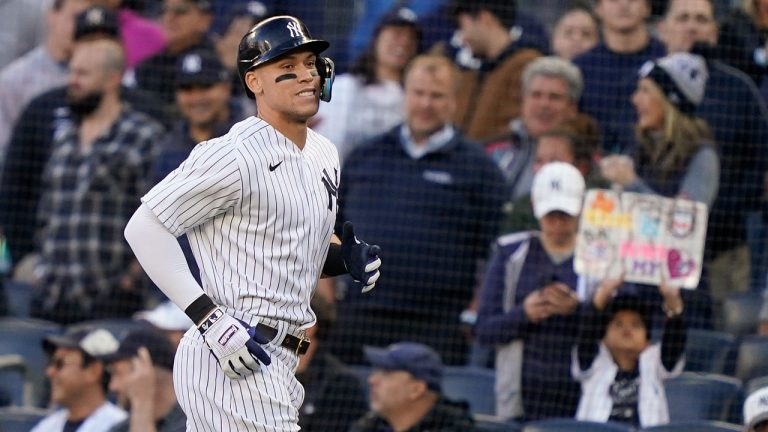 New York Yankees Aaron Judge comes off the field after grounding out against the Cleveland Guardians during the ninth inning of Game 2 of an American League Division baseball series. (John Minchillo/AP)