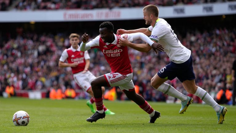 Arsenal's Eddie Nketiah, left, is challenged by Tottenham's Eric Dier during the English Premier League soccer match between Arsenal and Tottenham Hotspur, at Emirates Stadium, in London, England, Saturday, Oct. 1, 2022. (Kirsty Wigglesworth/AP) 