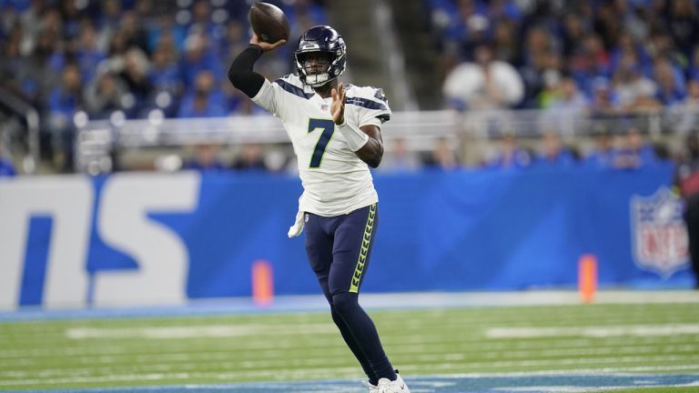 Seattle Seahawks quarterback Geno Smith passes during the first half of an NFL football game against the Detroit Lions, Sunday, Oct. 2, 2022, in Detroit. (Paul Sancya/AP)