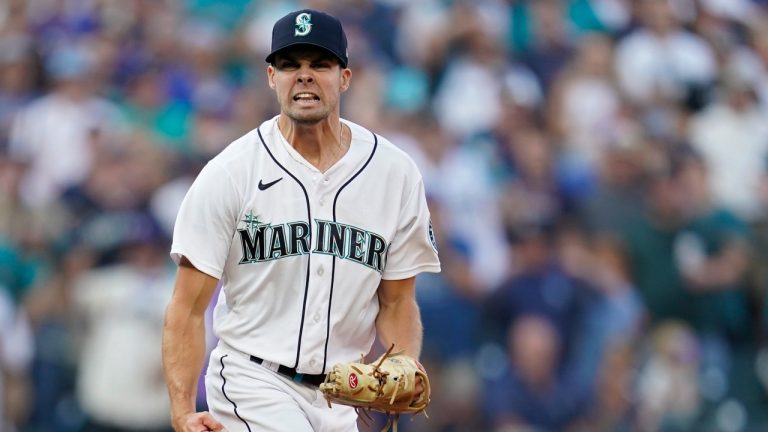 Seattle Mariners relief pitcher Matt Brash celebrates after striking out Houston Astros' Alex Bregman during the 10th inning in Game 3 of an American League Division Series baseball game Saturday, Oct. 15, 2022, in Seattle. (Abbie Parr/AP Photo)