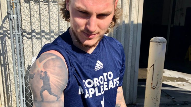 Adam Gaudette of the Toronto Maple Leafs shows off his tattoos on Thursday, October 6, 2022. (Luke Fox/Sportsnet)