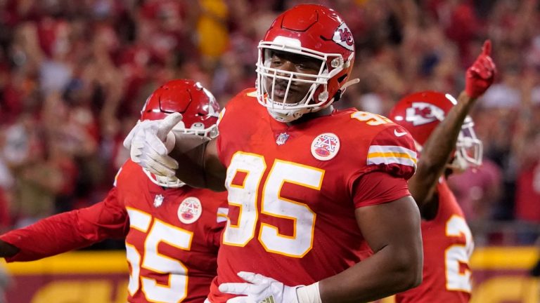 Kansas City Chiefs defensive tackle Chris Jones (95) celebrates after sacking Las Vegas Raiders quarterback Derek Carr during the first half of an NFL football game Monday, Oct. 10, 2022, in Kansas City, Mo.