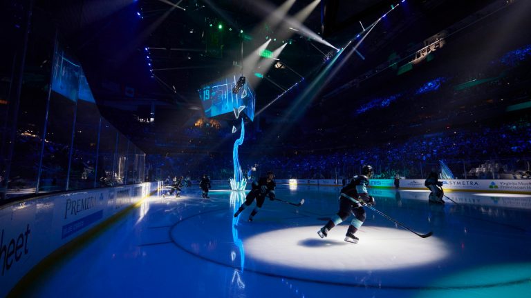 A light sculpture is projected during pregame introductions of the Seattle Kraken NHL hockey team before a game against the St. Louis blues in Seattle, Wednesday, Oct. 19, 2022. An original compostion by Grammy and Oscar Award winning composer Hans Zimmer was created specifically for the Kraken. (John Froschauer/AP) 