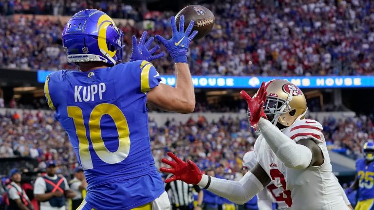 Los Angeles Rams' Cooper Kupp (10) catches a touchdown pass in front of San Francisco 49ers' Jaquiski Tartt during the first half of the NFC Championship NFL football game Sunday, Jan. 30, 2022, in Inglewood, Calif. (Mark J. Terrill/AP)