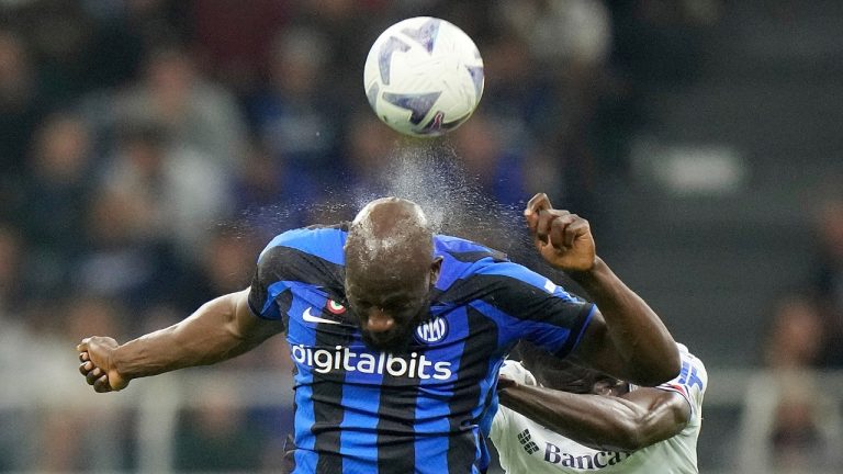 Inter Milan's Romelu Lukaku goes for the header with Sampdoria's Omar Colleyduring a Serie A soccer match between Inter Milan and Sampdoria at the San Siro stadium in Milan, Italy, Saturday, Oct.29, 2022. (Luca Bruno/AP)