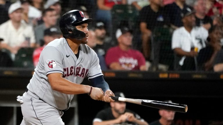 Cleveland Guardians' Josh Naylor watches his two-run home run off Chicago White Sox relief pitcher Jose Ruiz during the seventh inning of a baseball game Wednesday, Sept. 21, 2022, in Chicago. (Charles Rex Arbogast/AP)