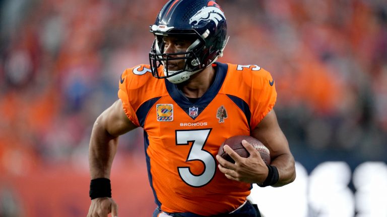 Denver Broncos quarterback Russell Wilson (3) scrambles against the Indianapolis Colts during the first half of an NFL football game, Thursday, Oct. 6, 2022, in Denver. (David Zalubowski/AP)