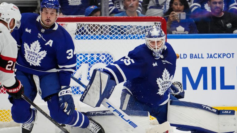 Ottawa Senators' Claude Giroux (28) shoots as Toronto Maple Leafs goaltender Ilya Samsonov (35) and Auston Matthews (34) try to make the save during second period NHL hockey action in Toronto on Saturday, October 15, 2022. (Frank Gunn/CP)