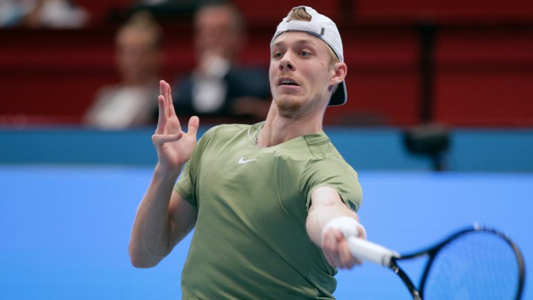 Denis Shapovalov of Canada returns a ball to Daniil Medvedev of Russia during the final match at the Vienna Open ATP tennis tournament in Vienna, Austria, Sunday, Oct. 30, 2022. (Heinz-Peter Bader/AP) 