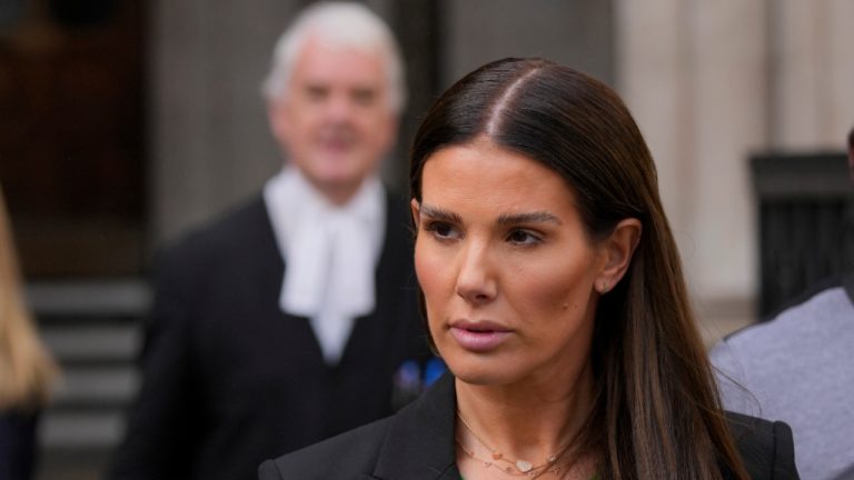 FILE - Rebekah Vardy departs the High Court in London, Thursday, May 19, 2022. On Friday, July 29, 2022, Judge Karen Steyn has cleared Coleen Rooney of libeling Vardy when she alleged that Vardy had leaked her private social media posts to the tabloid press. (Alastair Grant/AP) 