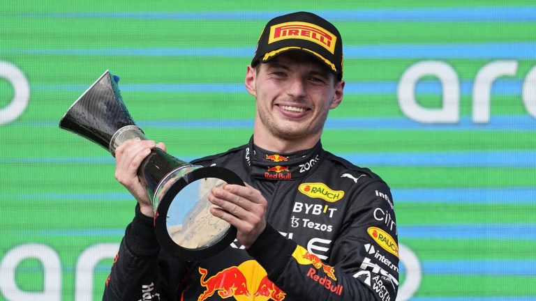 Red Bull driver Max Verstappen, of the Netherlands, raises the trophy after winning the Formula One U.S. Grand Prix auto race at Circuit of the Americas. (Charlie Neibergall/AP)