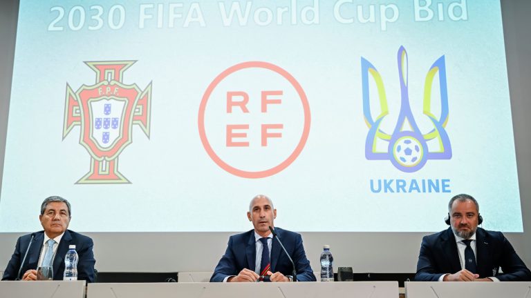 Portuguese Soccer Federation President Fernando Gomes, left, President of the Spanish Royal Federation of Soccer (RFEF), Luis Rubiales, center, Ukrainian Football Federation President Andriy Pavelko, right, speak during a press conference about the announcing that Ukraine is joining Spain and Portugal in their joint bid to host the World Cup in 2030, at the UEFA Headquarters, in Nyon, Switzerland, Wednesday, October 5, 2022. The proposal harnesses the idea that football can restore hope and peace, while Ukraine has been at war with Russia for months.(Martial Trezzini/Keystone via AP) 