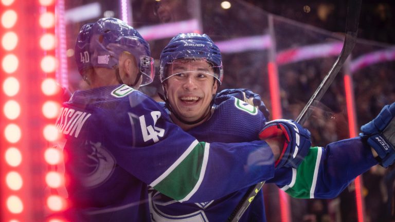 Vancouver Canucks' Andrei Kuzmenko (96) celebrates his third goal against the Anaheim Ducks during the third period of an NHL hockey game in Vancouver on Thursday, November 3, 2022. (Ben Nelms/CP)