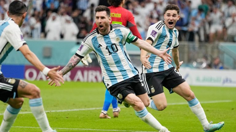 Argentina's Lionel Messi, center, celebrates with his teammates after scoring his side's opening goal during the World Cup group C soccer match between Argentina and Mexico, at the Lusail Stadium in Lusail, Qatar, Saturday, Nov. 26, 2022. (Ariel Schalit/AP)