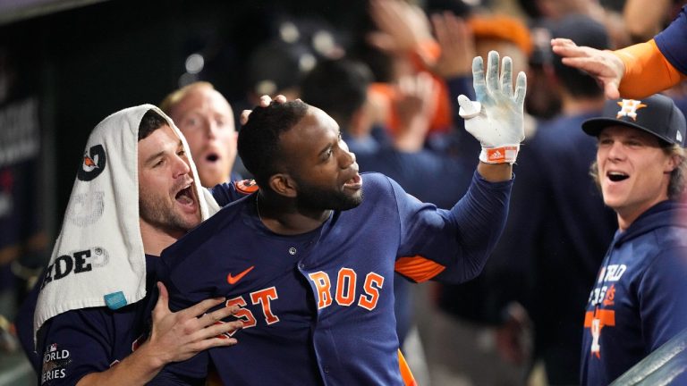 Houston Astros' Yordan Alvarez celebrates his three-run home run during the sixth inning in Game sixth of baseball's World Series between the Houston Astros and the Philadelphia Phillies on Saturday, Nov. 5, 2022, in Houston. (David J. Phillip/AP Photo)