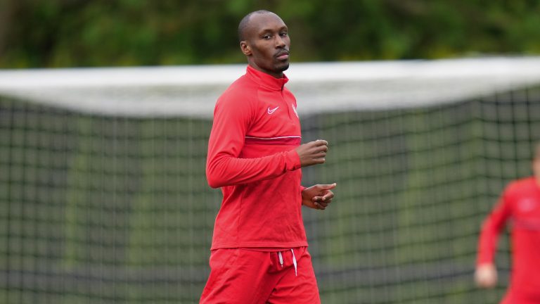 Canadian national men's soccer team midfielder Atiba Hutchinson jogs during a training session for a CONCACAF Nations League match against Curacao, in Vancouver, on Tuesday, June 7, 2022. (Darryl Dyck/CP)