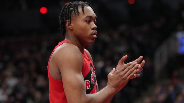 Toronto Raptors' Scottie Barnes reacts during first half action against the Miami Heat in Toronto on Wednesday, November 16, 2022. Barnes is out  a left knee sprain for their game against the Dallas Mavericks on Saturday (Chris Young/The Canadian Press)