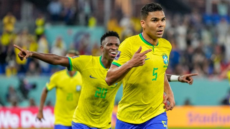 Brazil's Casemiro, right, celebrates after scoring his side's opening goal during the World Cup group G soccer match between Brazil and Switzerland, at the Stadium 974 in Doha, Qatar, Monday, Nov. 28, 2022. (Andre Penner/AP)