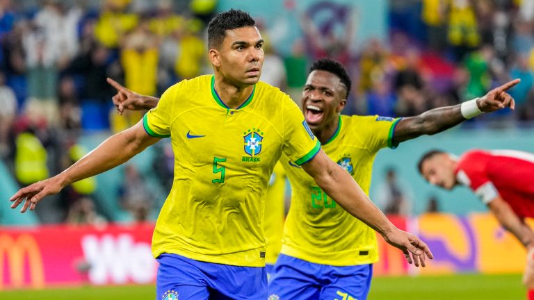 Brazil's Casemiro celebrates after scoring his side's opening goal during the World Cup group G soccer match between Brazil and Switzerland, at the Stadium 974 in Doha, Qatar, Monday, Nov. 28, 2022. (Andre Penner/AP)