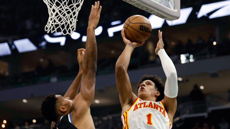 Atlanta Hawks forward Jalen Johnson (1) shoots against Milwaukee Bucks' Giannis Antetokounmpo (34) during the first half of an NBA basketball game, Saturday, Oct. 29, 2022, in Milwaukee. (Jeffrey Phelps/AP)