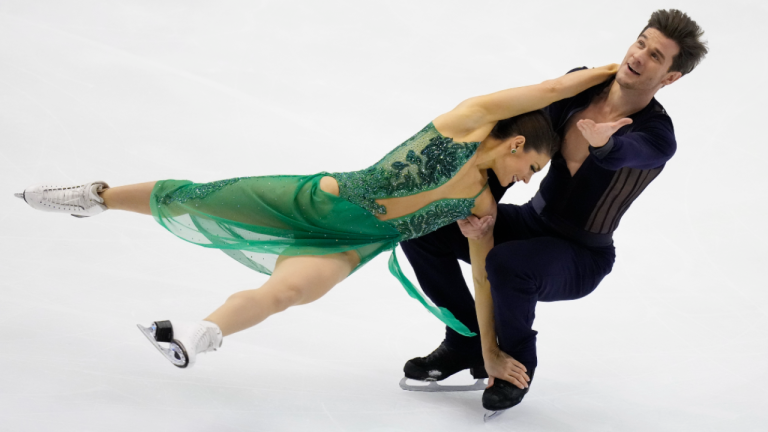 Laurence Fournier Beaudry, left, and Nikolaj Soerensen of Canada perform in the ice dance rhythm dance program in the Grand Prix of Figure Skating - NHK Trophy in Sapporo, Japan, Friday, Nov. 18, 2022. (AP)