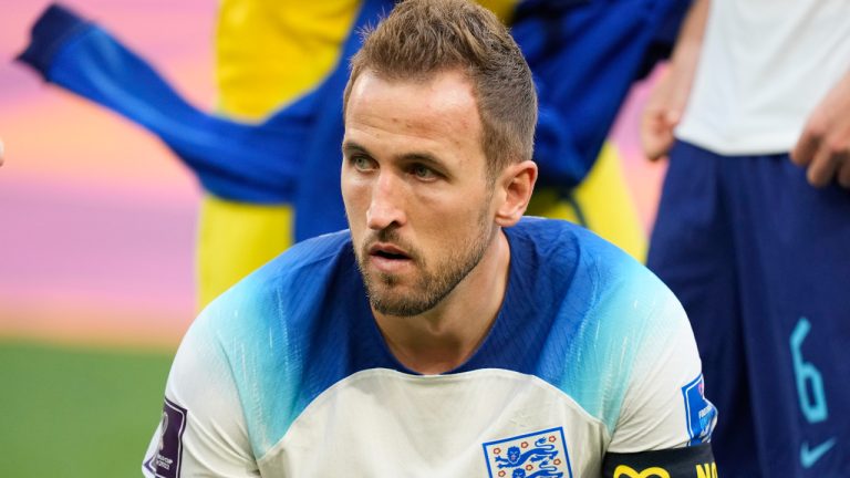 England's Harry Kane looks on before start of the World Cup group B soccer match between England and Iran at the Khalifa International Stadium, in Doha, Qatar, Monday, Nov. 21, 2022. (AP Photo/Martin Meissner)